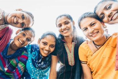 Community of women celebrating unity